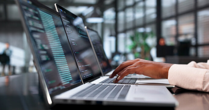 Young African Software Engineer Coding Secure Data On Laptop