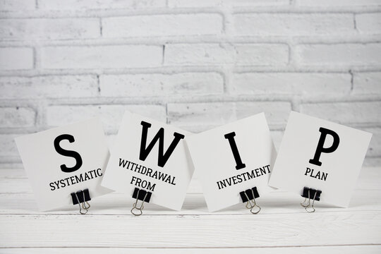 SWIP Systematic Withdrawal from Investment Plan text written on paper notes