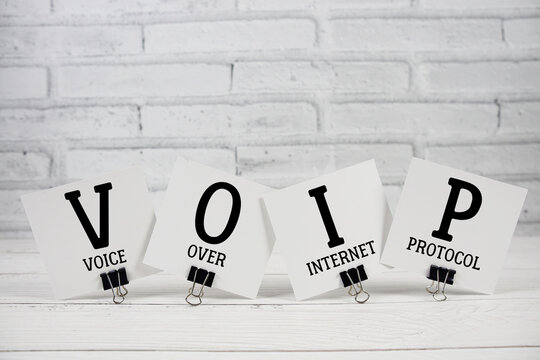 VOIP Voice over Internet Protocol text written on paper notes