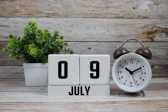 Wooden Calendar Showing the Date of July 9th. Day 9 of July month