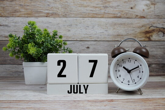 Wooden Calendar Showing the Date of July 27th. Day 27 of July month