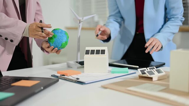 Business team working virtual modern smartphone to reduce CO2 emissions carbon footprint climate change to limit global warming.Sustainable development