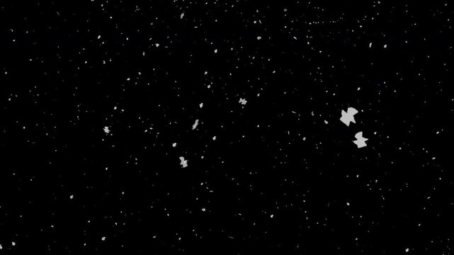 Winter wonderland scene with snowflakes on a dark night sky backdrop. Ideal for holiday designs, christmas cards, and seasonal graphics.