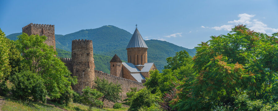 Medieval Ananuri castle complex with stone towers and church in Georgia with copy space