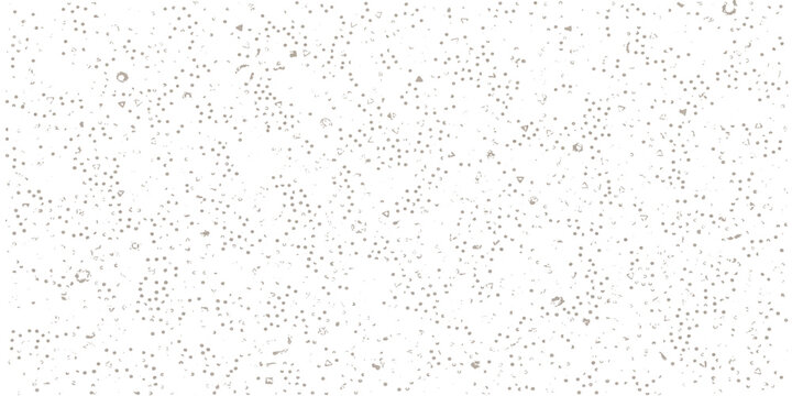 A macro photograph reveals a microscopic world teeming with spherical cells, appearing as tiny translucent orbs scattered across a subtle, textured background.