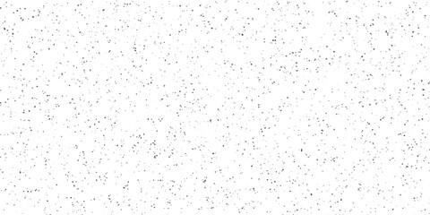 Naklejka premium A delicate and intricate abstract pattern of fine grey speckles scattered across a crisp white background, offering a minimalist and clean aesthetic.