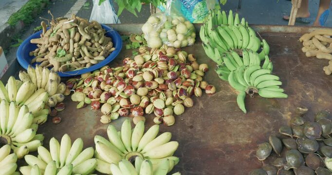 Vegetable and fruit sell in tradition market food with people hand grab Thailand