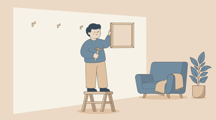 Fototapeta premium Man hanging picture frame on minimalist wall.