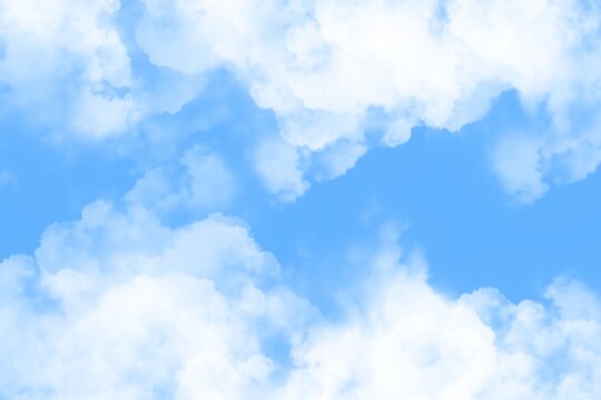 Bright Blue Sky with Soft White Clouds for Travel and Nature Scenes.