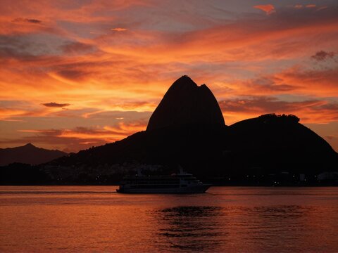 Sunset Silhouette of Sugarloaf Mountain with Boats
