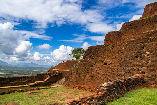 Ancient Brick Terraces of Sigiriya Fortress under a Blue Sky