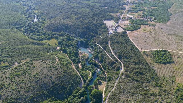 Kravica Waterfall, Bosnia and Herzegovina - June 7, 2026: Distant aerial panorama of the famous Kravica Waterfall and surrounding landscape