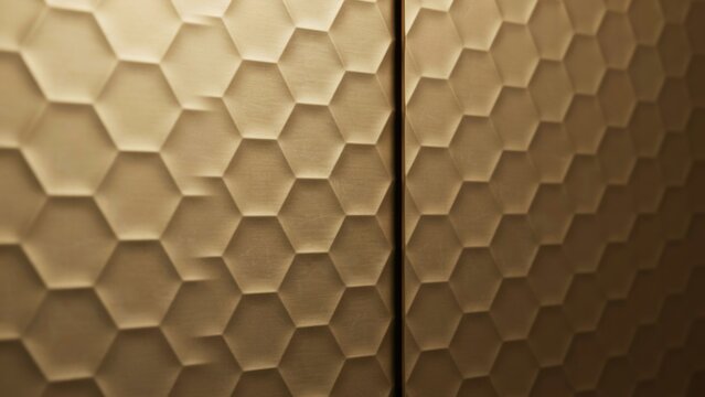 Embossed hexagonal pattern on beige wall with vertical seam
