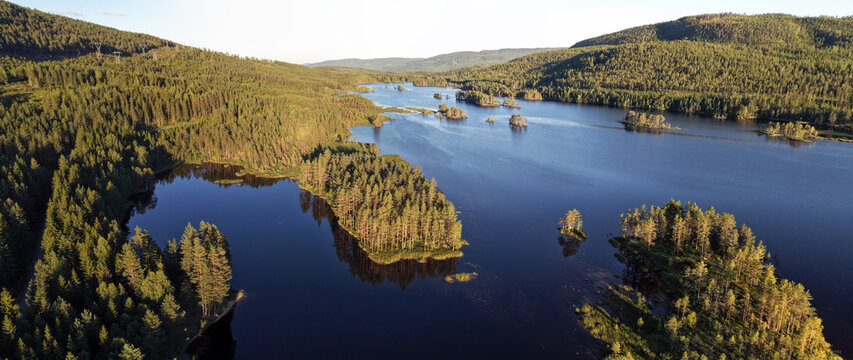 Norwegian lakes and islands at sunset, Buskerud, Hallingdal, Norway