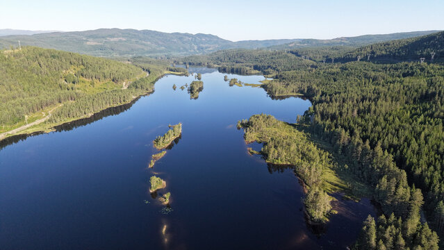 Norwegian lake, islands and reflections, Buskerud, Hallingdal, Norway