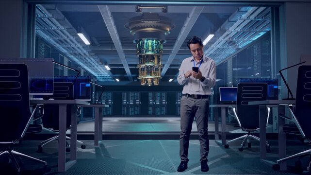 Full Body Of Asian Male Professional Worker With His Smartphone at Futuristic Quantum Computer Data Center Control Room, He Is Nodding His Head With Dissapionted