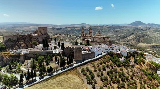Aerial view of Olvera Castle and church on hilltop, Cadiz, Andalusia