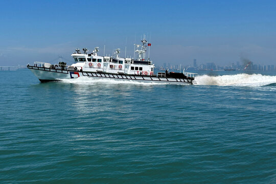 A Taiwan Coast Guard ship patrols around Taiwan's strategically vital Kinmen islands with the  mainland coast clearly visible in the background amid rising cross-strait tensions.
