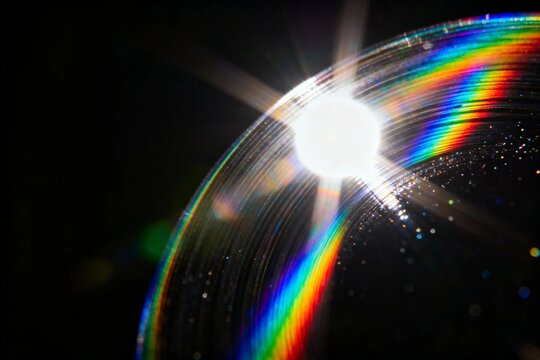 Rainbow Light Refraction on CD Surface