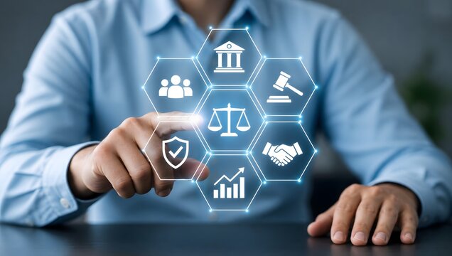 Businessman pointing at virtual screen displaying legal compliance icons for law, justice, government, privacy, and business ethics.