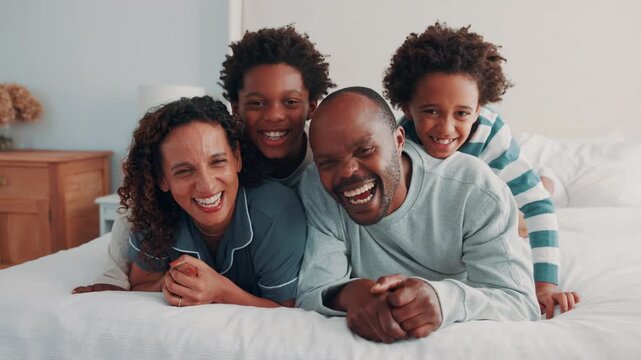 Fun, stack and black family on bed with face, security or bonding together on day off. Support, parents or children in house with portrait, happy moment or playful relationship on weekend break.