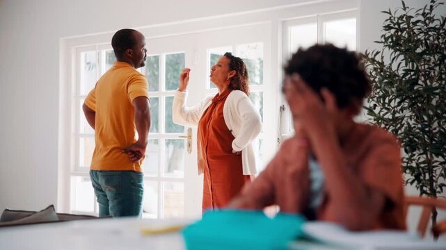 Parents, fight and kid in home with stress, homework distraction and trauma for child development. Angry, African people and son learning in house with conflict, mother and father argue for divorce.