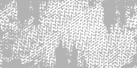 Obraz premium Gray and white textured grunge background with distressed pattern and halftone dots abstract