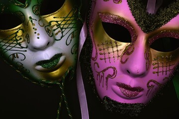 mardi gras carnival masks on black background  © Adriana
