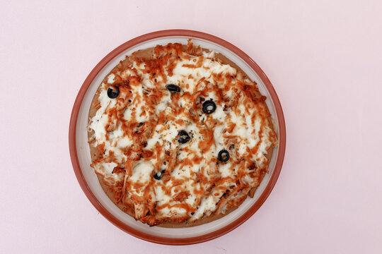Cheese Pizza Top View on White Plate