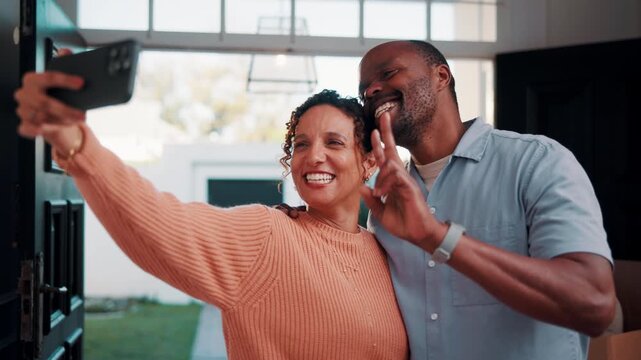 Happy, couple and peace sign in new house with selfie, social media post and property investment. Married, mature African people and moving in dream home with smile, v gesture or picture for memories