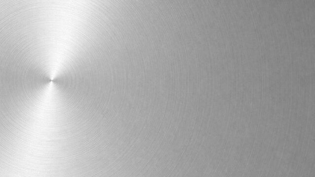 Sandblasted aluminum with circular machining marks cool metal texture background