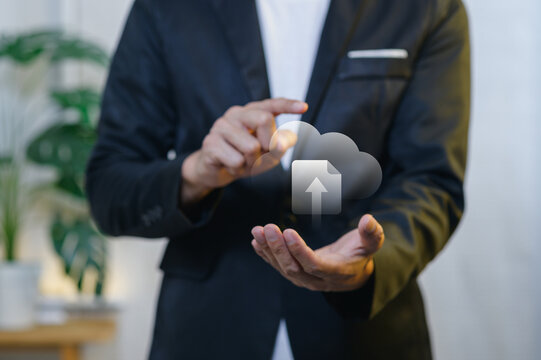 Businessman Using Touchscreen Technology to Upload Cloud Data in Office