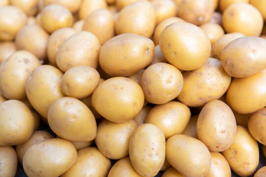 Close-up of fresh washed potatoes with blurred background