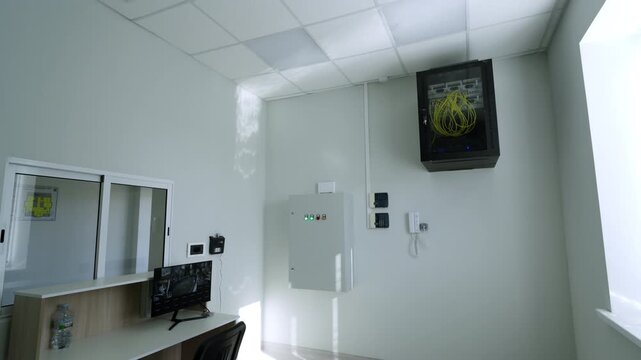 Structured server facility interior features intercom phone and secure keypads. Organized engineering design looks clean and ready
