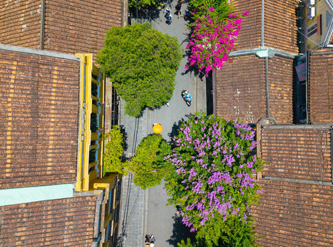 Aerial drone view of Hoi An city, Quang Nam province, Vietnam. Panoramic footage of Ancient town, UNESCO world heritage. One of the most travel popular touristic destinations