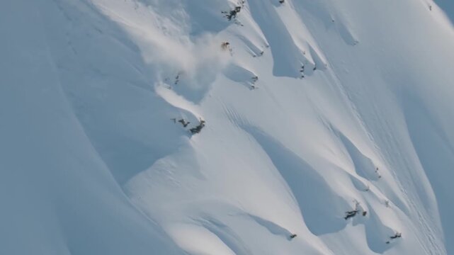 Alaska Skiing, Extreme Backcountry Skiing Down Steep Powder Slopes in Alaska