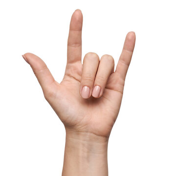 Woman hand showing the sign of the horns or rock gesture