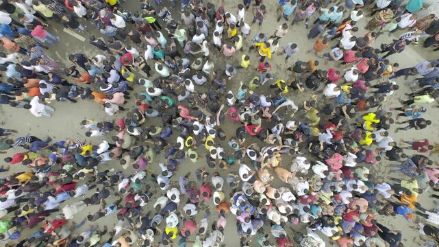 Aerial drone footage of the Rath Yatra festival in Odisha, India, showing decorated chariots, thousands of devotees, and the vibrant atmosphere of this iconic Hindu religious procession.