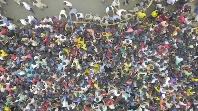 Aerial drone footage of the Rath Yatra festival in Odisha, India, showing decorated chariots, thousands of devotees, and the vibrant atmosphere of this iconic Hindu religious procession.