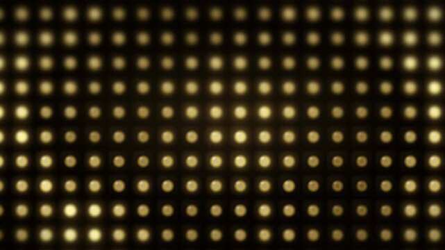 Extreme Close-Up of Shifting Patterns on a Golden LED Digital Stage