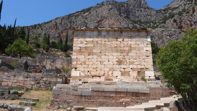 Athenian Treasury ruins in the ancient greek sanctuary of Delphi