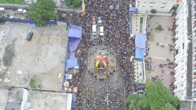 Aerial drone footage of the Rath Yatra festival in Odisha, India, showing decorated chariots, thousands of devotees, and the vibrant atmosphere of this iconic Hindu religious procession.