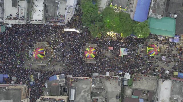 Aerial drone footage of the Rath Yatra festival in Odisha, India, showing decorated chariots, thousands of devotees, and the vibrant atmosphere of this iconic Hindu religious procession.