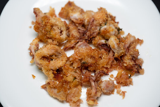 Tasty and light baked squid au gratin