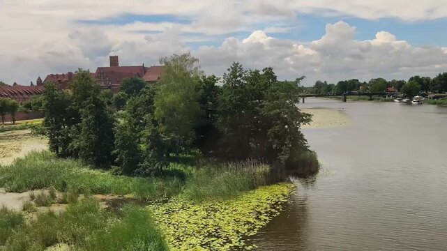 Malbork castle landscape with river from train
