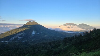 Fototapeta premium This is sunrise and fog in Ijen Mountain in East Java, Indonesia