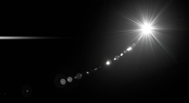 A bright, star-like light source with a flare and circular bokeh effects