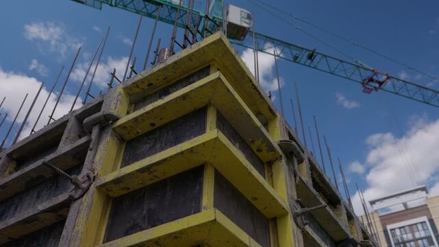 Corner section of concrete wall formwork at construction site