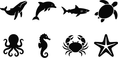 Sea fish and Marine life and sea creatures black silhouette icon set featuring whale dolphin shark turtle and octopus © ORCHONA