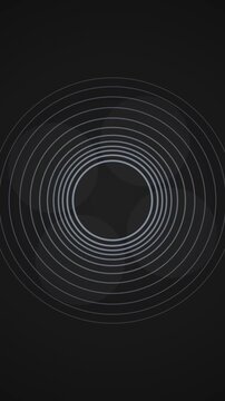 Abstract concentric rings on dark background highlighting motion and focus